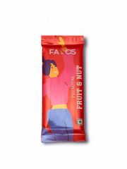 A selection of brightly packaged Fancis chocolate bars arranged on a pink background, with dark chocolate squares at the center.