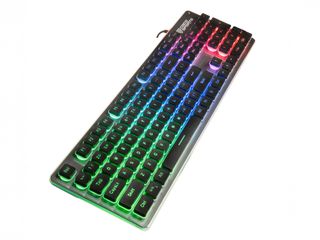 Black keyboard with rainbow LED backlight on a white background