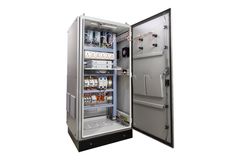 A large, industrial-looking electrical control panel with its door open, revealing various electrical components.