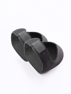 A pair of grey knee caps with velcro closures, displayed on a white background.